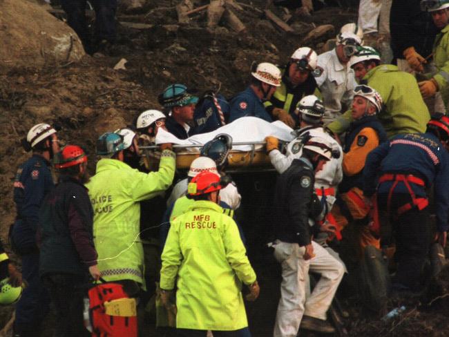 Sunday Telegraph 75th Anniversary pictures. PIRATE: Rescue workers carry Thredbo ski instructor & summer tour guide Stuart Diver from the rubble, 02/08/1997. He was rescued after being trapped for more than 60 hours when a steep embankment of Alpine Way Road collapsed washing away Carinya Lodge & Bimbadeen Staff Lodge.