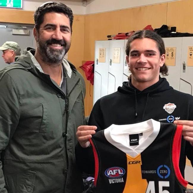 Paul Goonan with his son Luca at the Dandenong Stingrays’ jumper presentation.