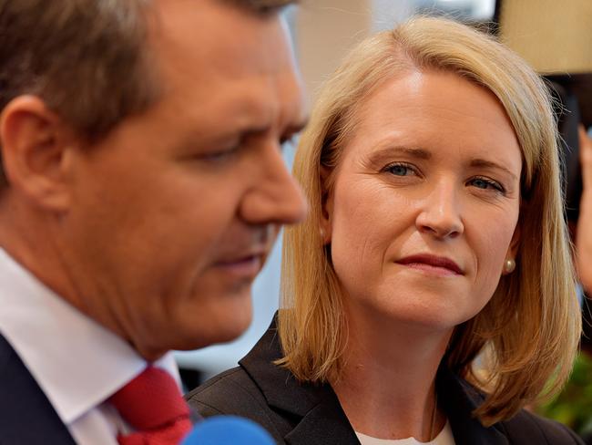 Deputy Chief Minister Nicole Manison while Chief Minister Michael Gunner speaks to the media after being sworn into cabinet at Government House by the Administrator of the Northern Territory John Hardy.
