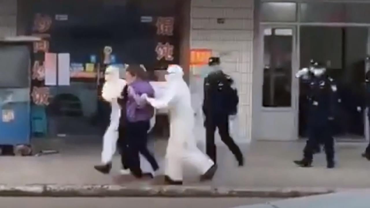 A family of four is dragged from its home.