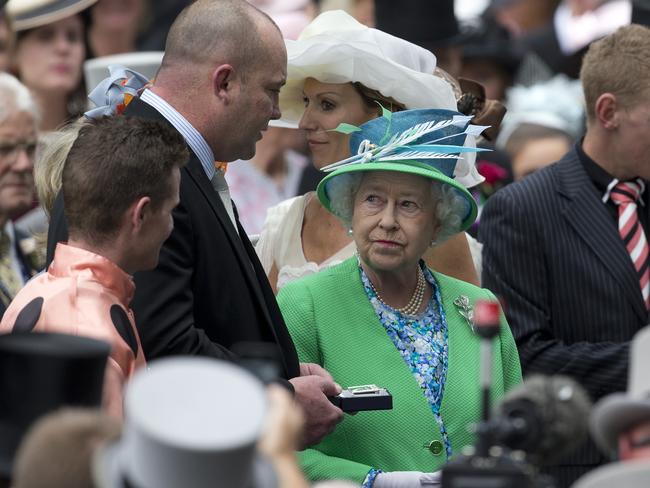 Moody chats with the Queen after winning the Diamond Jubilee Stakes at Royal Ascot.