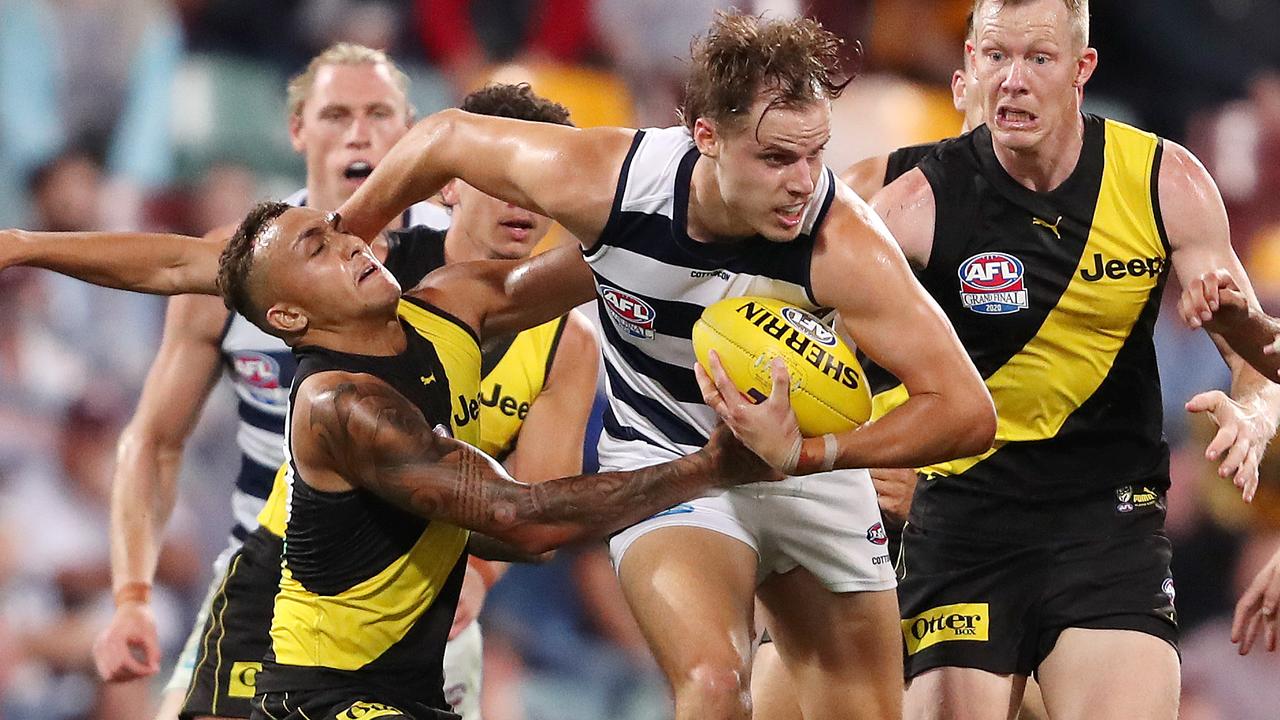 The Tigers’ trademark pressure was too hot for Geelong to handle in the first-ever night Grand Final. Picture: Sarah Reed