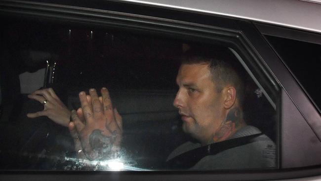 Zlatko Sikorsky is seen in a police vehicle arriving to Maroochydore Police Station, on June 30, 2018. (AAP Image/Darren England)