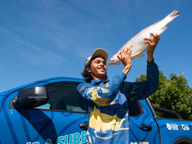 Keegan Payne with his million dollar barra. Picture: Pema Tamang Pakhrin