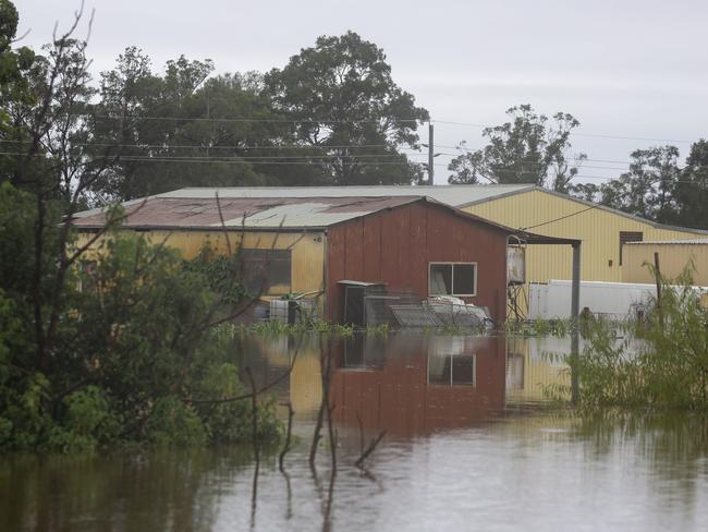 Major flooding in Windsor, Sydney where the bridge has been closed, homes are completely destroyed and seen underwater as the SES crews deliver emergency medical and food supplies. Picture: NCA NewsWire / Gaye Gerard