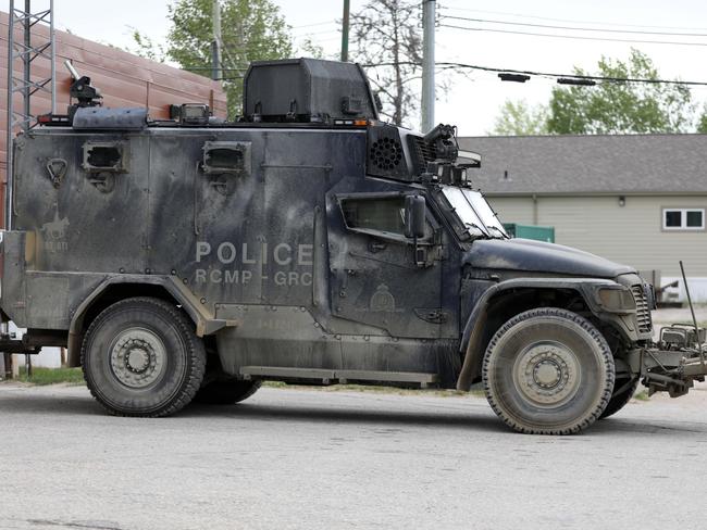 Heavily armed tactical police are searching for the teen fugitives in Gillam. Picture: Clint Brewer/ NEWS360