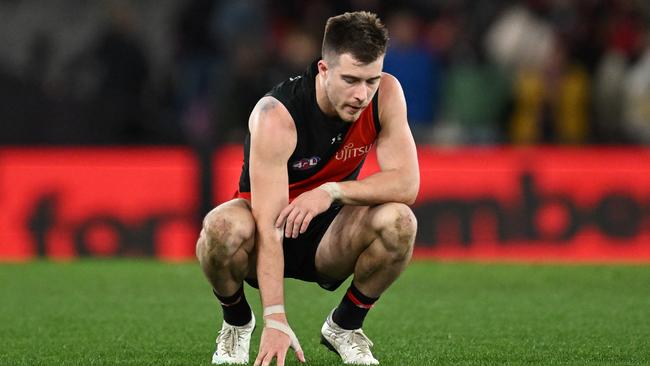 MELBOURNE, AUSTRALIA - JULY 19: Zach Merrett of the Bombers reacts on the final siren during the round 19 AFL match between Essendon Bombers and Adelaide Crows at Marvel Stadium, on July 19, 2024, in Melbourne, Australia. (Photo by Daniel Pockett/Getty Images)