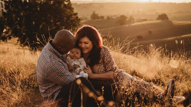 Fleur Madden with husband Jimmy Gwisai and their baby Josiah. Picture: First Echo Photography