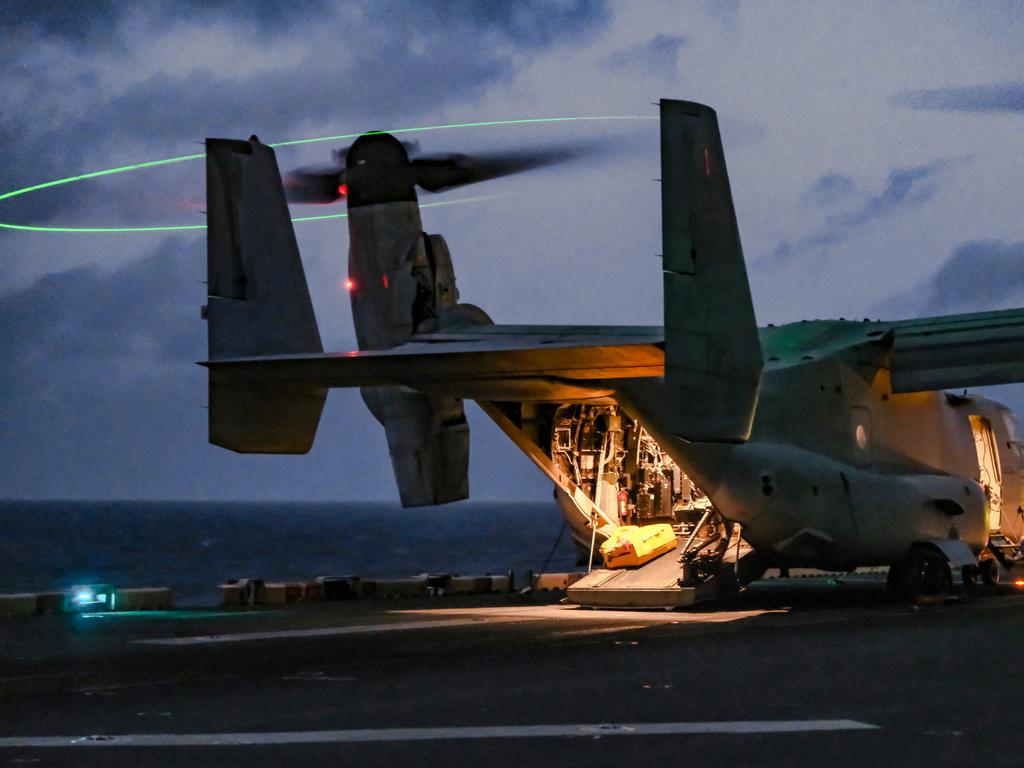 A U.S. Marine Corps MV-22B Osprey with Marine Medium Tiltrotor Squadron 265 (Reinforced), 31st Marine Expeditionary Unit (MEU), prepares for take-off aboard the amphibious assault ship USS America (LHA 6), during Talisman Sabre on July 14, 2021. The MV-22B provides combat commanders with extended range and flexibility for a wide range of missions. Australian and U.S. forces combine biannually for Talisman Sabre, a month-long multi-domain exercise that strengthens allied and partner capabilities to respond to the full range of Indo-Pacific security concerns. The 31st MEU is operating aboard ships of America Expeditionary Strike Group in the 7th fleet area of operations to enhance interoperability with allies and partners and serve as a ready response force to defend peace and stability in the Indo-Pacific region. (U.S. Marine Corps photo by Staff Sgt. John Tetrault)