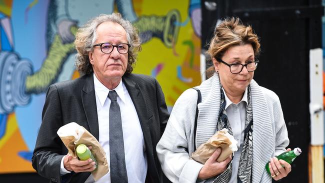 ***RETRANSMITTING FOR ALL IMAGES WITH OBJECT NAME*** GEOFFREY RUSH COURT***  CHANGING TO FEDERAL COURT***  Australian actor Geoffrey Rush (left) is seen at the Federal Court in Sydney, Wednesday, July 4, 2018. The virtually housebound actor Geoffrey Rush has ventured into Sydney's Federal Court to attend mediation related to his defamation case against the Daily Telegraph. The actor was snapped entering and leaving the court on Wednesday, as was journalist Jonathon Moran. (AAP Image/Brendan Esposito) NO ARCHIVING