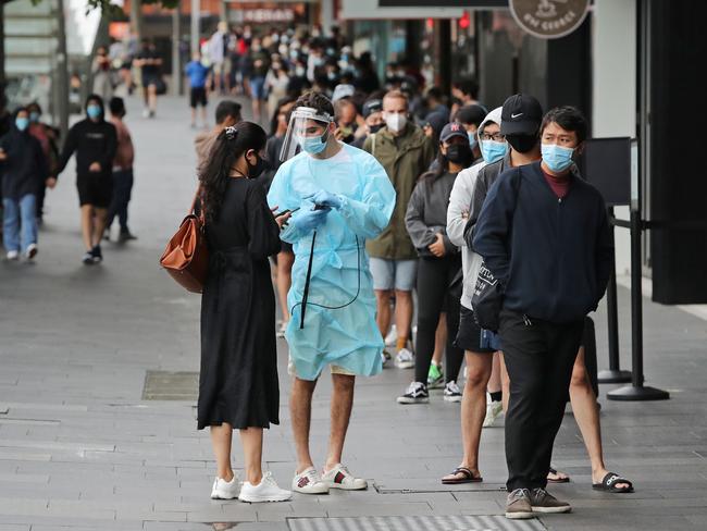 A queue for Covid testing at Ultimo in Sydney on Monday. The line wrapped around the block for hundreds of meters. Picture: Richard Dobson