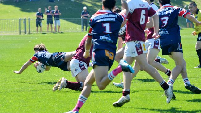 Batten dived over for the first try of the match in the under-18s. Picture: Leigh Jensen