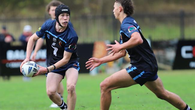 Western halfback Callum Miskell unloads on day one of the NSWCHS 15s schoolboys state trials at Collegians Sports Ground. Picture: Steve Montgomery