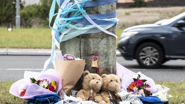 A memorial for the two teens who died after a stolen car crashed into a power pole. Picture: Monique Harmer