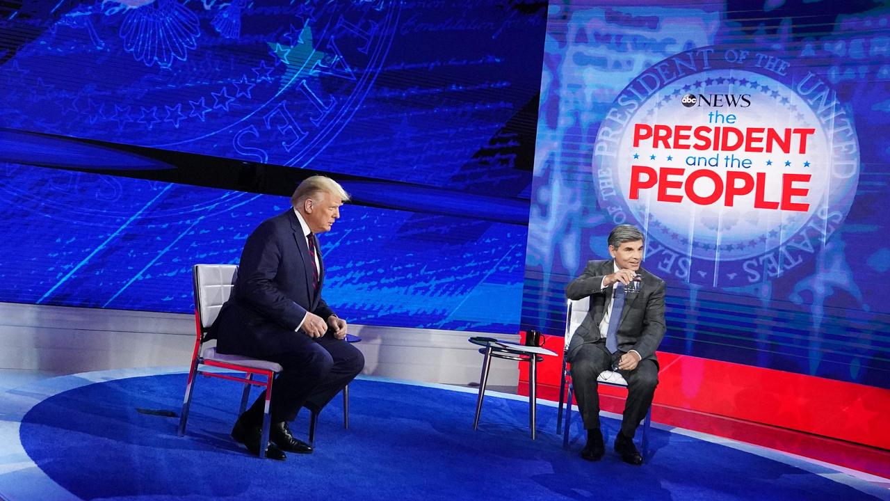 Mr Trump alongside moderator George Stephanopoulos today. Picture: Mandel Ngan/AFP