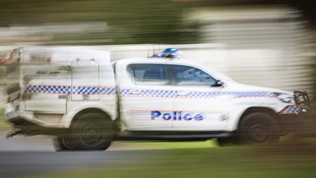 A police vehicle under lights and sirens on Ruthven St in Toowoomba, Wednesday, April 24, 2024. generic Queensland Police, QPS, police Picture: Kevin Farmer