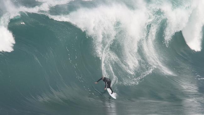 Australian big wave surfer Dylan Longbottom and the wipeout that put him in hospital at a South Australian reef break. Picture: Andrew Brooks