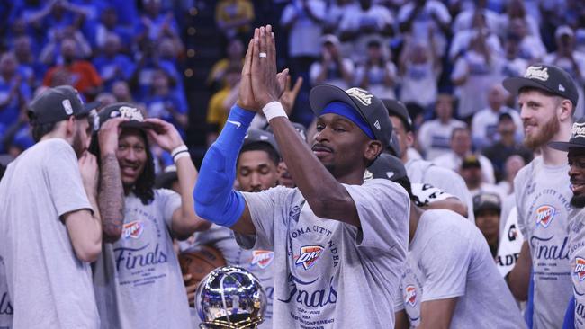 Oklahoma City Thunder guard Shai Gilgeous-Alexander celebrates with teammates. (AP Photo/Nate Billings)