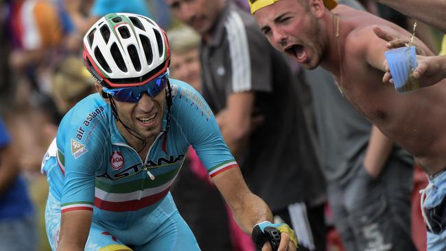 Italy's Vincenzo Nibali rides in a breakaway as supporters cheer during the 138km nineteenth stage.