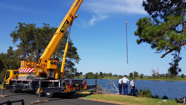 A crane was used to salvage the car from the river. Picture: Frank Redwood