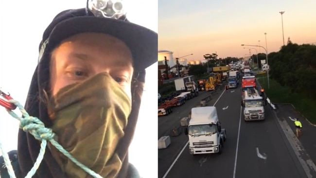 The Blockade Australia activist – who livestreamed the event - climbed a nine-metre monopole, blocking off a busy intersection in Port Botany. Picture: Facebook