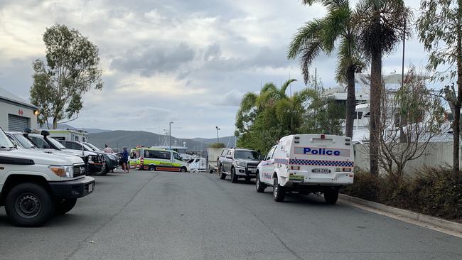 Emergency services at Coral Sea Marina after reports a tinny was spiralling. Picture: Elyse Wurm