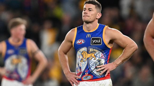 MELBOURNE, AUSTRALIA - MAY 26: Dayne Zorko of the Lions (C) and Jack Payne of the Lions (R) looks dejected after the round 11 AFL match between Hawthorn Hawks and Brisbane Lions at Marvel Stadium, on May 26, 2024, in Melbourne, Australia. (Photo by Daniel Pockett/Getty Images)