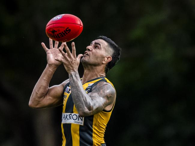 PINT's Warwick Williams leaps for the ball in the 2023-24 NTFL season. Picture: Patch Clapp / AFLNT Media