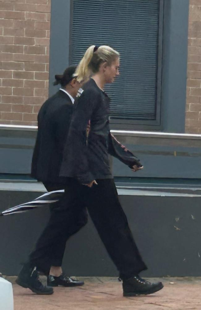 Teresa Morrissey (black boots, blonde hair) leaving Wyong Local Court with her lawyer on Monday morning. Picture: NewsLocal