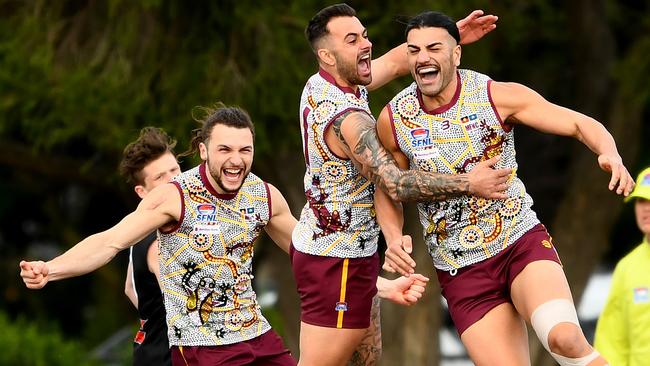 Steve Tolongs of Murrumbeena is congratulated by team mates after kicking a goal during the Southern Football Netball League 2023 Division 2 Senior match between Murrumbeena and Doveton Doves at Murrumbeena Park in Murrumbeena, Victoria on July 8, 2023. (Photo by Josh Chadwick)