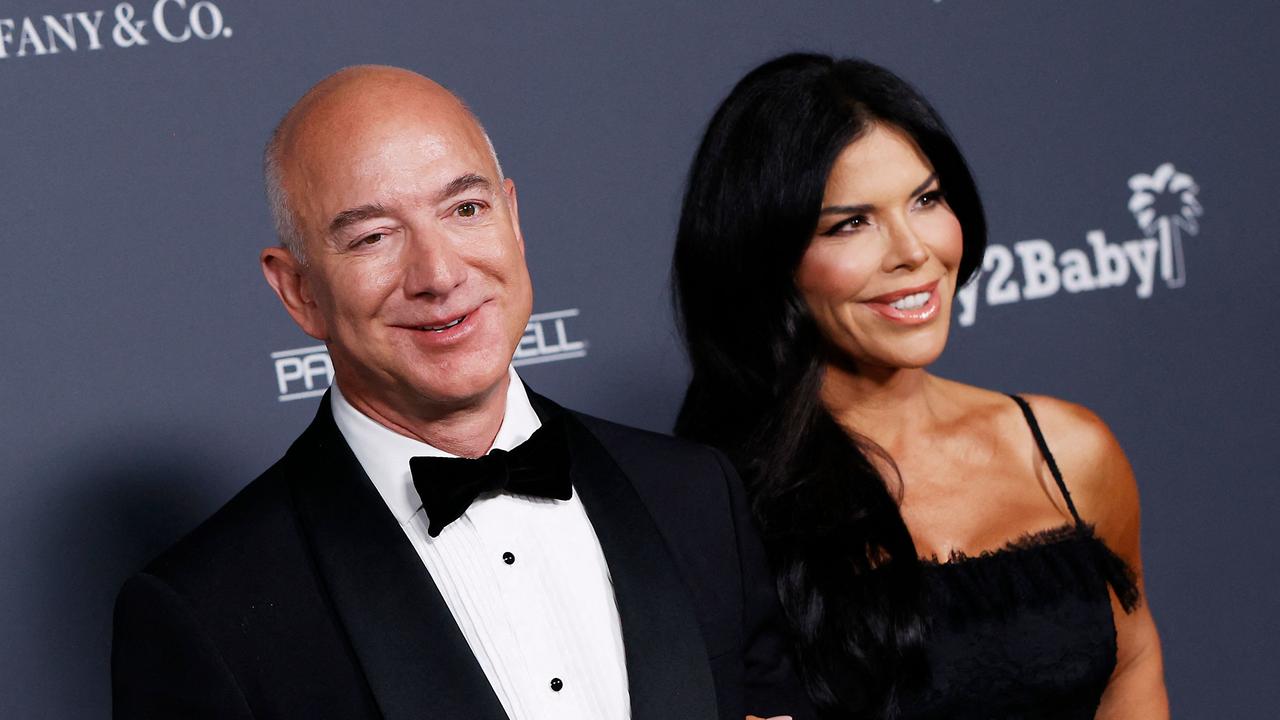 Jeff Bezos pictured with girlfriend Lauren Sanchez. Picture: Michael Tran/AFP