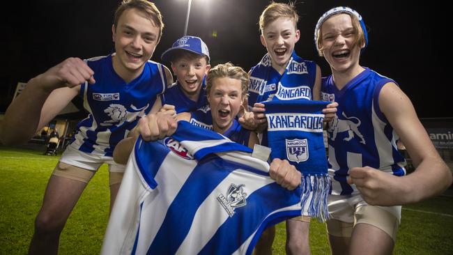 Sandy Bay Lions U14 team members Harry Wood, 14, left, Max Mennitz, 13, Louis Smith, 14, Campbell Baker, 13, and Al Hoper, 14, get excited for the Kangaroos v Giants match at Blundstone Arena. Picture: RICHARD JUPE