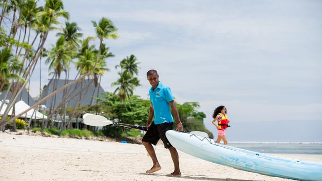 A staff member at the Shangri-La Fijian Resort &amp; Spa in Fiji. Picture: Allan Stephen