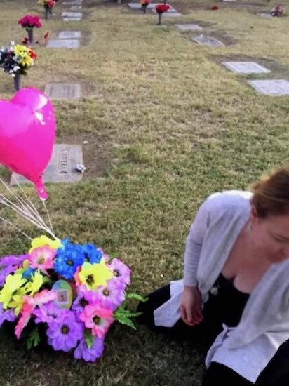 Ms Cunningham at Sanaa’s gravesite Picture: Supplied