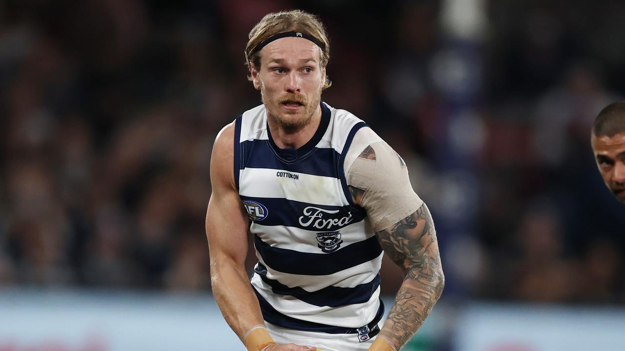 MELBOURNE, AUSTRALIA - August 19, 2023. AFL . Tom Stewart of the Cats looks for an option during the round 23 match between St Kilda and Geelong at Marvel Stadium in Melbourne, Australia. Photo by Michael Klein.