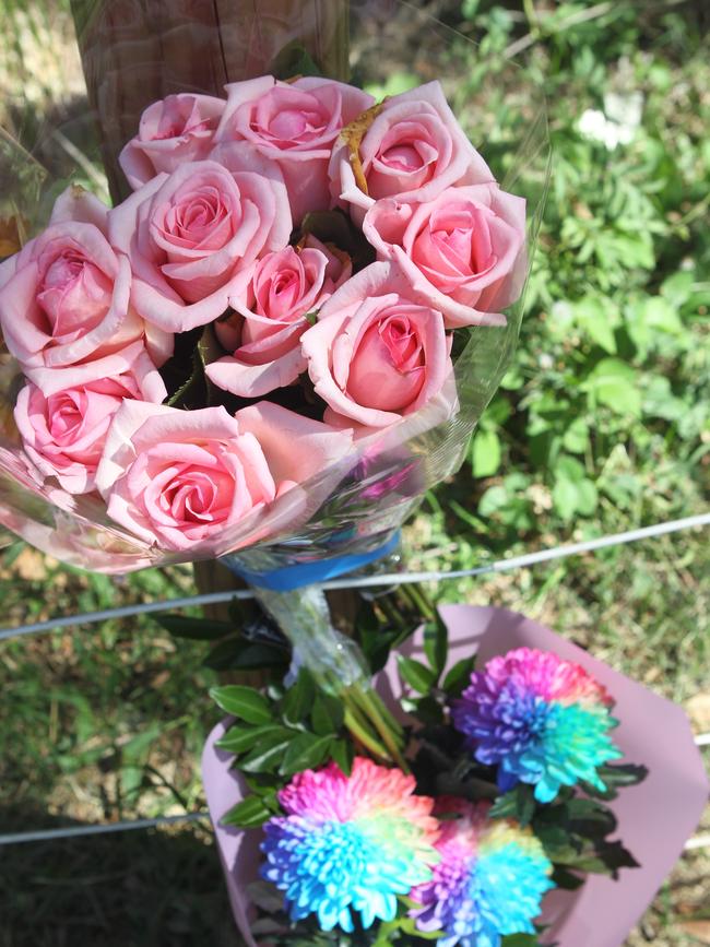 Floral tributes at the scene. Picture: Richard Gosling.