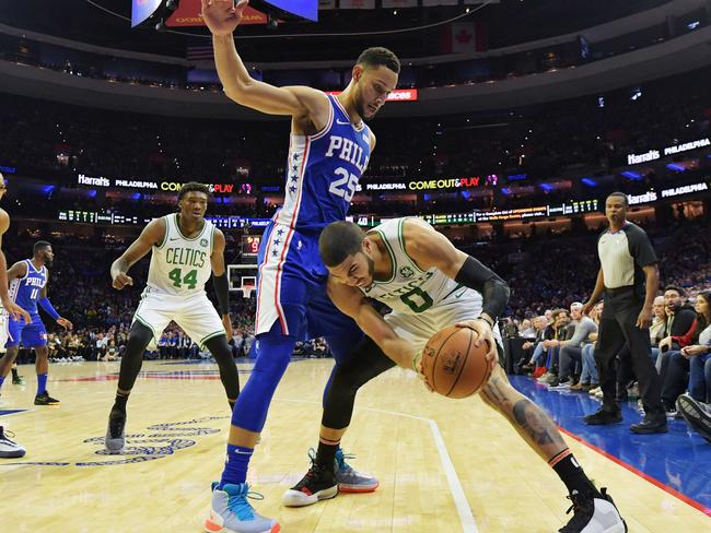 PHILADELPHIA, PA - OCTOBER 23: Ben Simmons #25 of the Philadelphia 76ers pressures Jayson Tatum #0 of the Boston Celtics at Wells Fargo Center on October 23, 2019 in Philadelphia, Pennsylvania. NOTE TO USER: User expressly acknowledges and agrees that, by downloading and or using this photograph, User is consenting to the terms and conditions of the Getty Images License Agreement.   Drew Hallowell/Getty Images/AFP == FOR NEWSPAPERS, INTERNET, TELCOS & TELEVISION USE ONLY ==