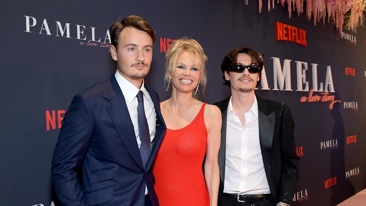 Anderson and her sons Brandon Thomas Lee and Dylan Jagger Lee walk the red carpet. Picture: Charley Gallay/Getty Images for Netflix