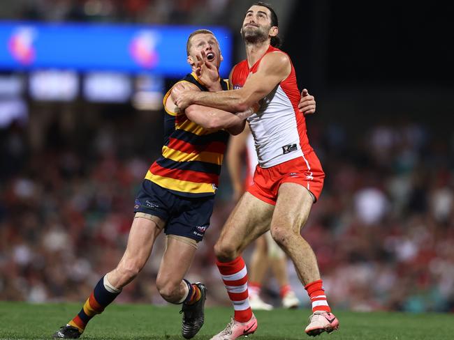 SYDNEY, AUSTRALIA - AUGUST 24: Brodie Grundy of the Swans and Reilly O'Brien of the Crows compete in a ruck contest during the round 24 AFL match between Sydney Swans and Adelaide Crows at Sydney Cricket Ground on August 24, 2024 in Sydney, Australia. (Photo by Jason McCawley/AFL Photos/via Getty Images)