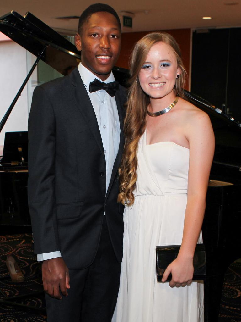 Archford Mazai and Emma McAllan at the 2013 Our Lady of the Sacred Heart Catholic College formal. Picture: NT NEWS