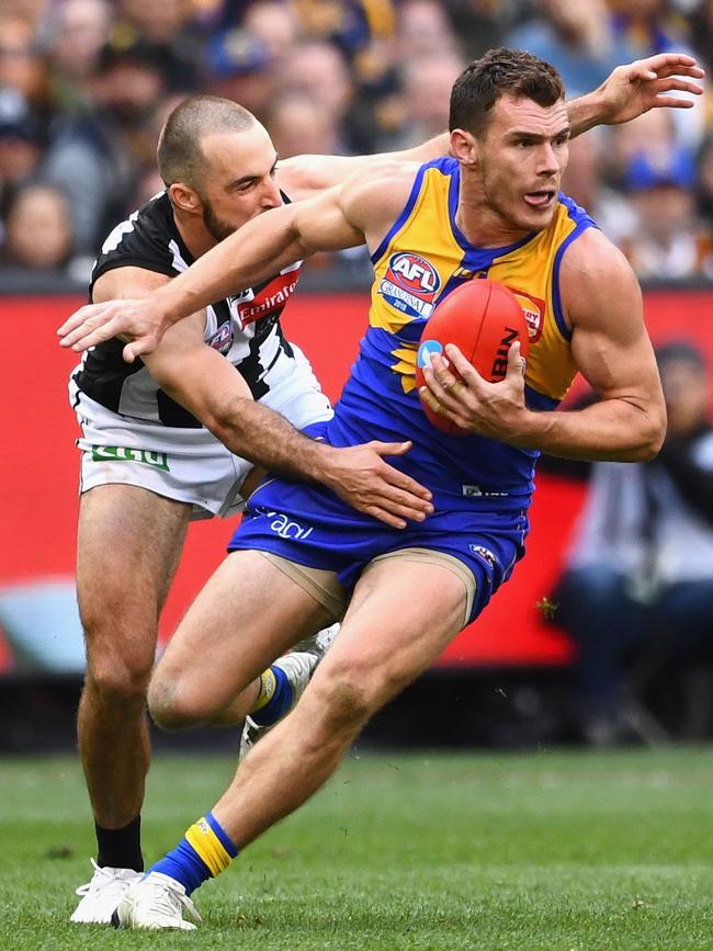 West Coast Eagles Luke Shuey is tackled by Magpies Steele Sidebottom in the 2018 AFL Grand Final at MCG. Picture: Quinn Rooney/Getty