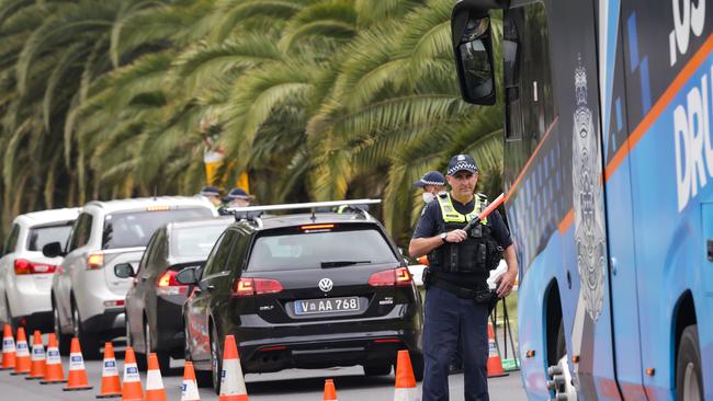 MELBOURNE, AUSTRALIA - NewsWire Photos DECEMBER 23, 2022 : Victoria Police pull over drivers at a roadside drug and alcohol testing site in Southbank, as part of Operation Roadwise in the lead up to Christmas. Picture NCA NewsWire / Ian Currie