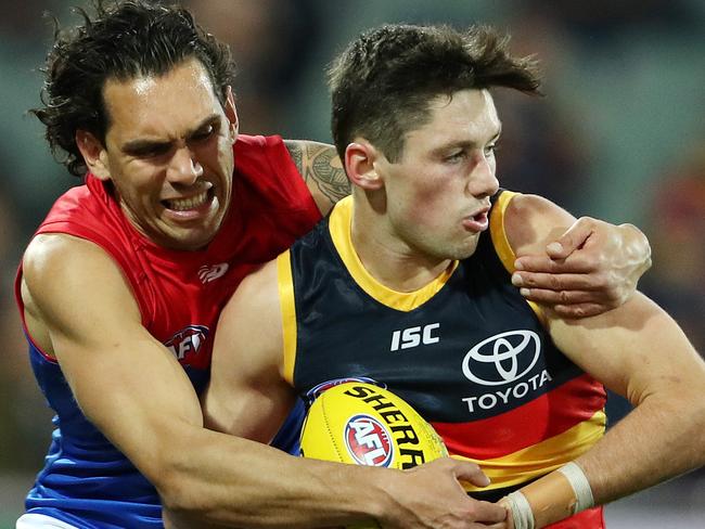 AFL - Wednesday, August 5th, 2020 - Adelaide Crows v Melbourne Demons at the Adelaide Oval. Adelaide's Chayce Jones and Melbourne's Harley Bennell Picture: Sarah Reed