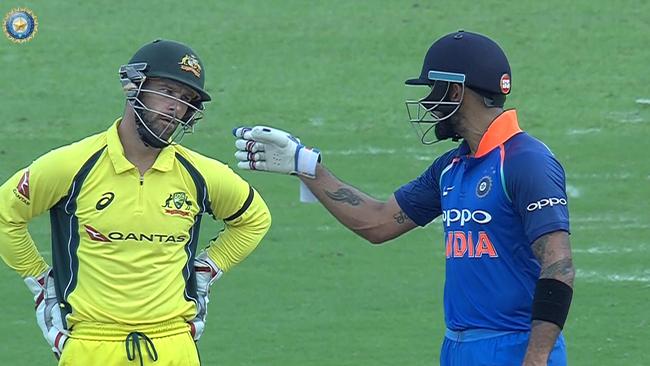 Virat Kohli and Matthew Wade exchange words during the second ODI.