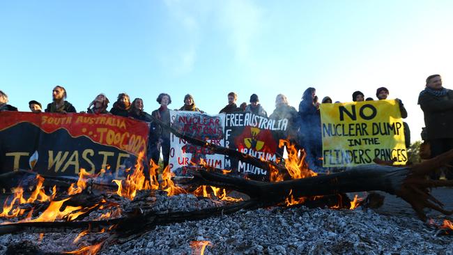 SA Police close Olympic Way as anti-uranium protesters light bonfire in ...