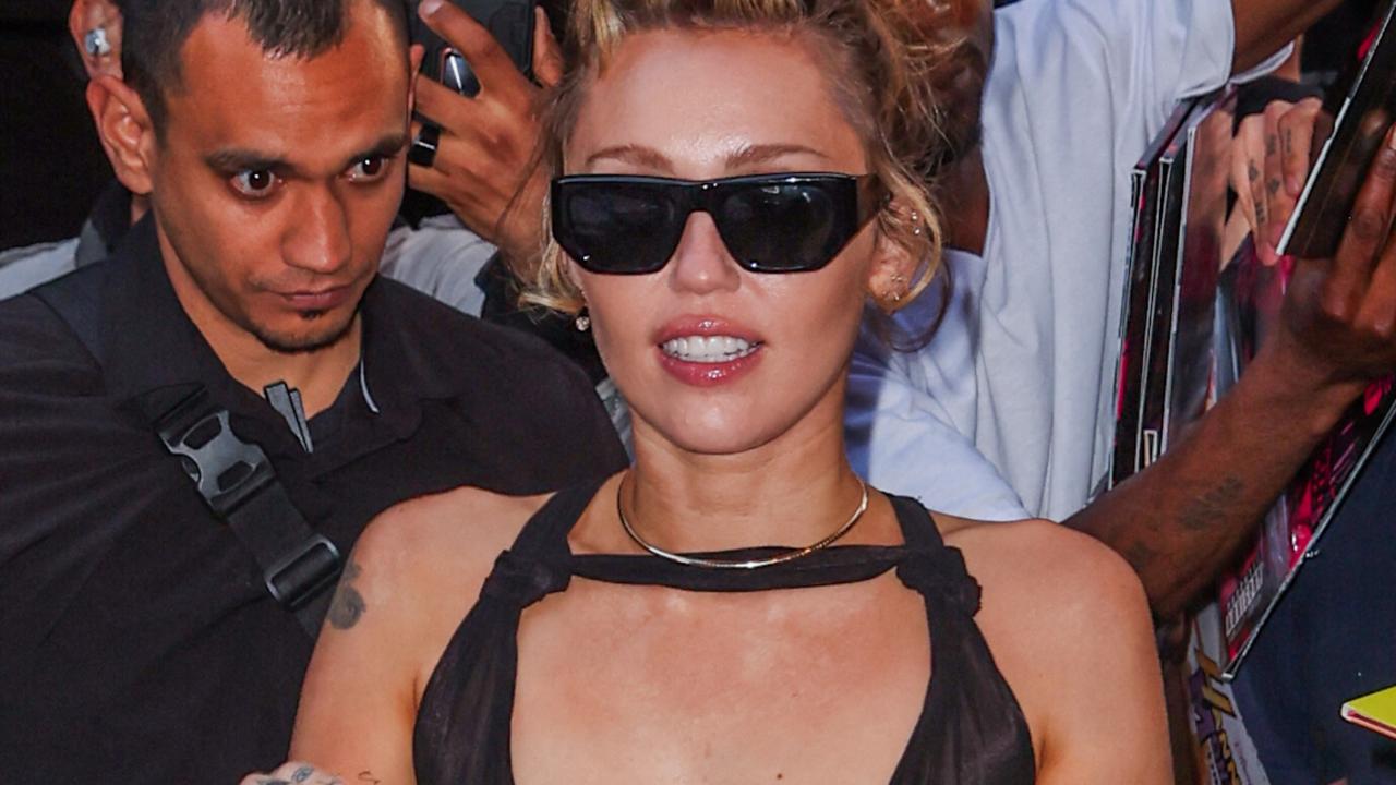 Miley rocks totally sheer dress in public