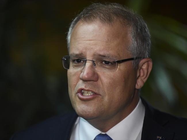 Australian Prime Minister Scott Morrison speaks to the media after arriving for the G20 summit in Buenos Aires, Argentina, Thursday, November 29, 2018. Leaders of the G20 Nations will be meeting in Buenos Aires over the next two days. (AAP Image/Lukas Coch) NO ARCHIVING