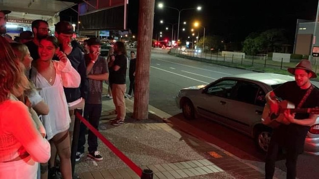 Patrons queue outside Nobby Beach bar Nightcap, unable to enter due to COVID-19 restrictions. Picture: Supplied