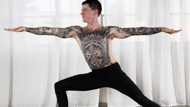 Nick Hall does yoga to help keep his body in shape. Picture: Michael Klein