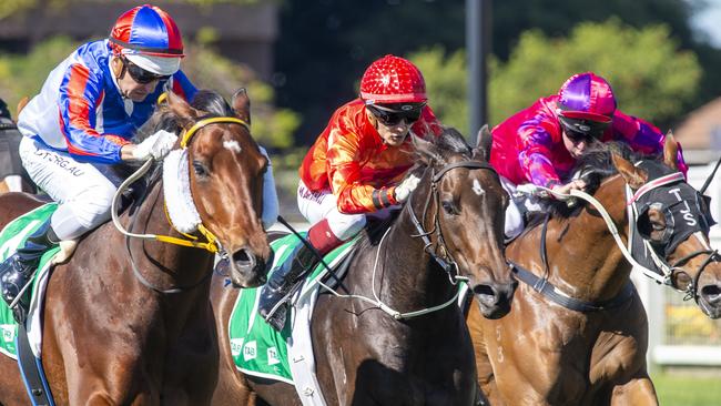 Taylor Marshall (centre) steered Red Chase to another win at Eagle Farm. Picture: AAP